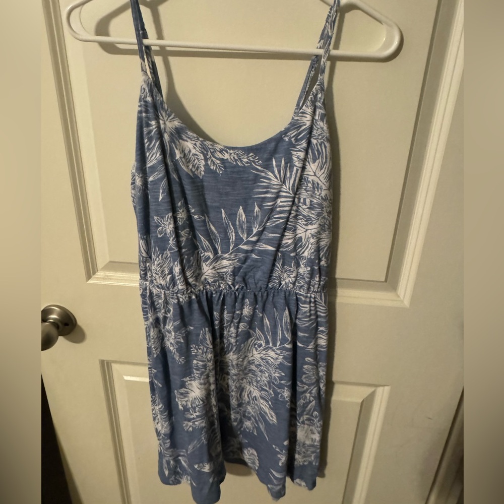 Cute cotton dress with adjustable spaghetti straps featuring fun floral print, S